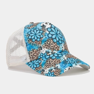 Detail of leopard and floral print panels with breathable mesh on the baseball cap