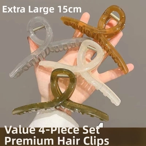 Macro view of 15cm large hair claw clips in four transparent colors for thick hair