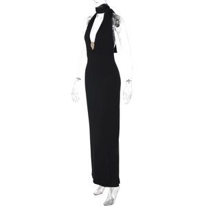 Sleek black halter maxi dress featuring a detailed golden lion head buckle on the neckline