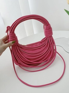 Rose red crescent handbag with unique multi-strand knotted tubular leather wrap design