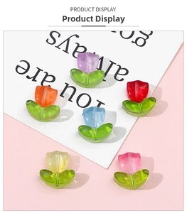 Macro shot of colorful glass tulip petal beads for DIY jewelry making and crafts