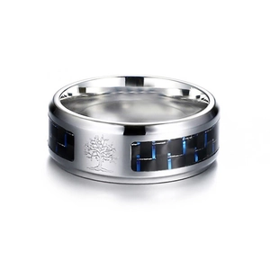 Macro view of 8mm stainless steel ring with blue carbon fiber and tree of life carving