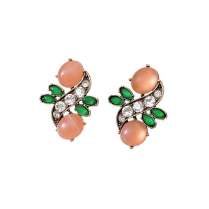 Vintage bronze jewelry set with orange oval resin stones and green leaf accents