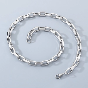 Detailed view of silver stainless steel square link chain necklace with lobster clasp