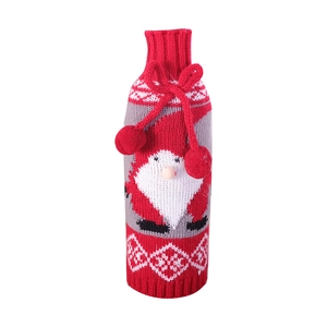 Knitted Santa gnome wine bottle cover in red and grey with drawstring and white pompom