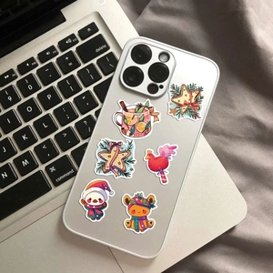 Waterproof Christmas PVC stickers applied on a transparent phone case for winter decoration