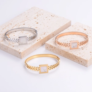 Minimalist geometric hollow 304 stainless steel bangle with shell inlay in three colors
