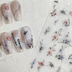 Ink painting style press-on nails with floral motifs and calligraphy art stickers