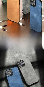 Close-up of leather texture phone cases in brown, blue and grey for iPhone 13