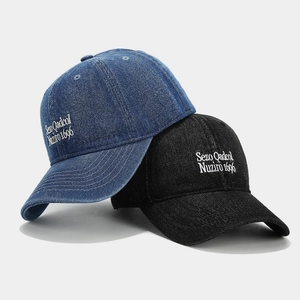 Vintage denim baseball caps with white letter embroidery in dark blue and black colors
