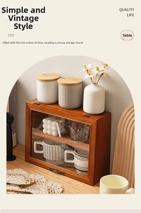 Close-up of vintage wood storage cabinet with glass flip door and metal handle