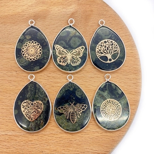Natural malachite green teardrop pendants with six assorted gold metal art patterns