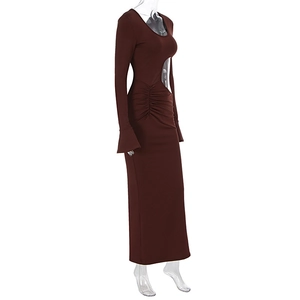 Detail of waist cutout and ruched side on a dark brown bodycon long sleeve maxi dress