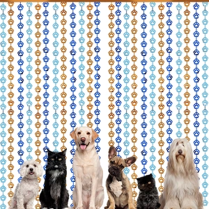 Blue and orange paw print backdrop fringe curtain with diverse cat and dog party motifs