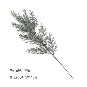 Detailed view of artificial frosted pine branch, 34.5x11cm green cedar spray for decor