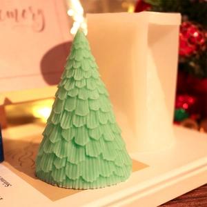 3D Christmas tree silicone mold and green scented candle for DIY festive decorations