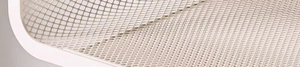 Close-up of the breathable white metal mesh structure on the expandable kitchen shelf