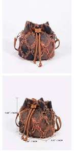 Detailed size chart of tie-dye denim bucket bag with frayed edges and brown leather trim