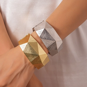 Irregular geometric textured wide open bangle in gold and silver finish for women
