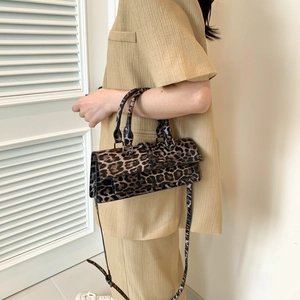 Fashionable leopard print crossbody bag for women with top handles and PU leather finish