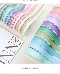 Detail of colorful matte cotton ribbons in macaron shades for elegant gift wrapping