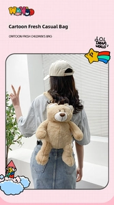 Detail showing the fluffy texture and adjustable straps of a cute teddy bear plush backpack