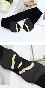 Detail of black elastic waist belt featuring a gold butterfly buckle with lychee texture