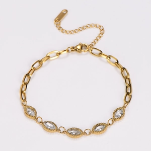Detail of gold chain bracelet featuring five marquise-cut cubic zirconia and adjustable tail