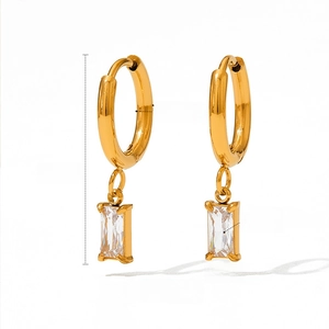 Detail of 25mm gold hoop earrings featuring 3mm rectangular zircon pendants and 1.8mm band