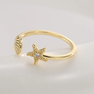 Verstellbarer vergoldeter Ring mit kreativem Seestern und Muschel Design mit Zirkonstein
