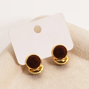 Close-up of vintage brown flocked earrings on white display card with 18K gold plated base