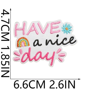 Macro shot of colorful Have a Nice Day embroidered patch showing size 6.6cm x 4.7cm