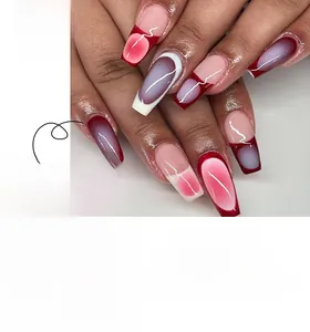 Detail of short coffin press on nails with red blush gradient and white line design