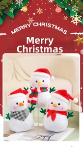 Detailed close-up of plush Christmas snowmen trio with festive scarves and red hats