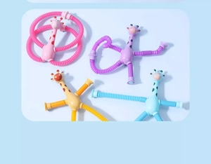 Close-up of four colorful suction cup giraffe robot pop tube toys in vibrant pastel colors