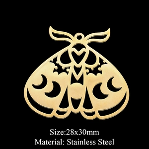 Detailed view of 28x30mm golden moth pendant in stainless steel on black background
