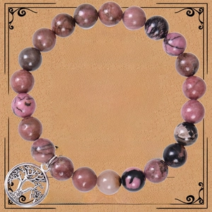 Bracelet en pierres roses et violettes avec pendentif arbre de vie sur une carte cadeau prof