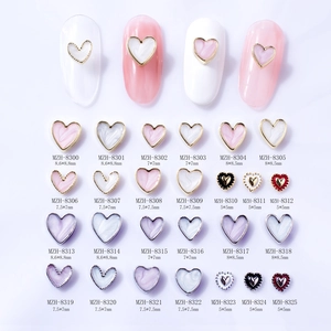 Enamel heart nail art charms set with metal edges in various colors and sizes