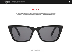 Front view of stylish black cat eye sunglasses with dark grey lenses in high gloss finish