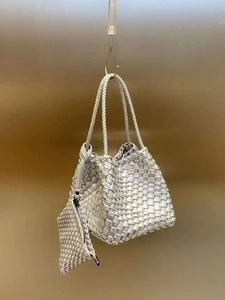 Silver hand-woven bucket bag set with matching pouch and single top handle