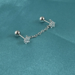 Surgical steel chain earring featuring star cubic zirconia stud and screw back ball
