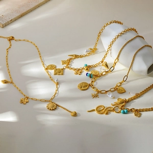 Gold-plated necklaces and bracelets set with heart, flower pendants and pearls