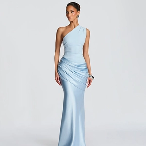 Detailed view of ruched satin fabric and one-shoulder draping on the light blue evening gown
