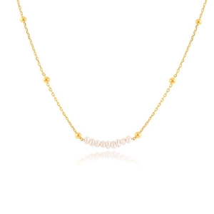 Detail of Y-shaped gold plated necklace with small freshwater pearls and gold beads