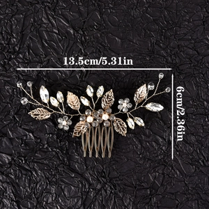Detail view of handmade bridal hair comb with gold leaves and pearls measuring 13.5x6cm