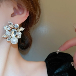 Elegant geometric faux pearl and rhinestone floral stud earrings for women with gold finish