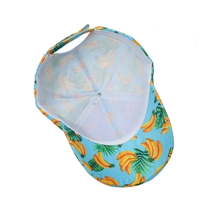 Detail view of tropical banana leaf print baseball cap with adjustable buckle