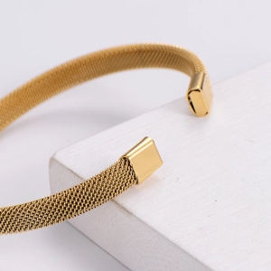 Minimalist 18k gold plated stainless steel mesh strap cuff bracelet in adjustable design