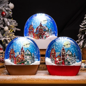 Christmas musical snow globe lanterns with rotating scenes and warm LED lighting display