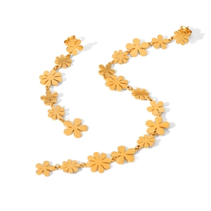 Elegant gold titanium steel floral drop earrings featuring a long chain of four-petal flowers